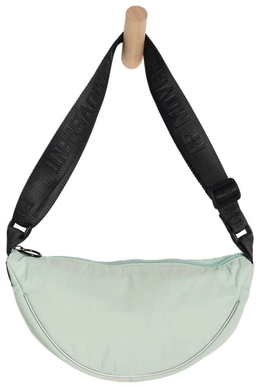 NEW FREE PEOPLE women's bullseye sling bag in pistachio